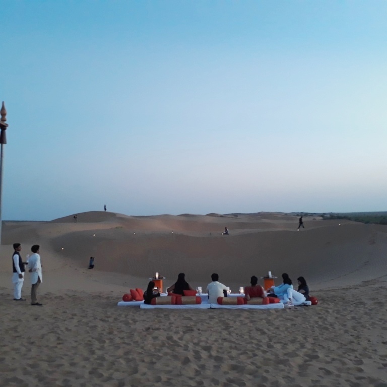 Enjoying sundowners at Desert National Park, Suryagarh, Jaisalmer, Rajasthan, India