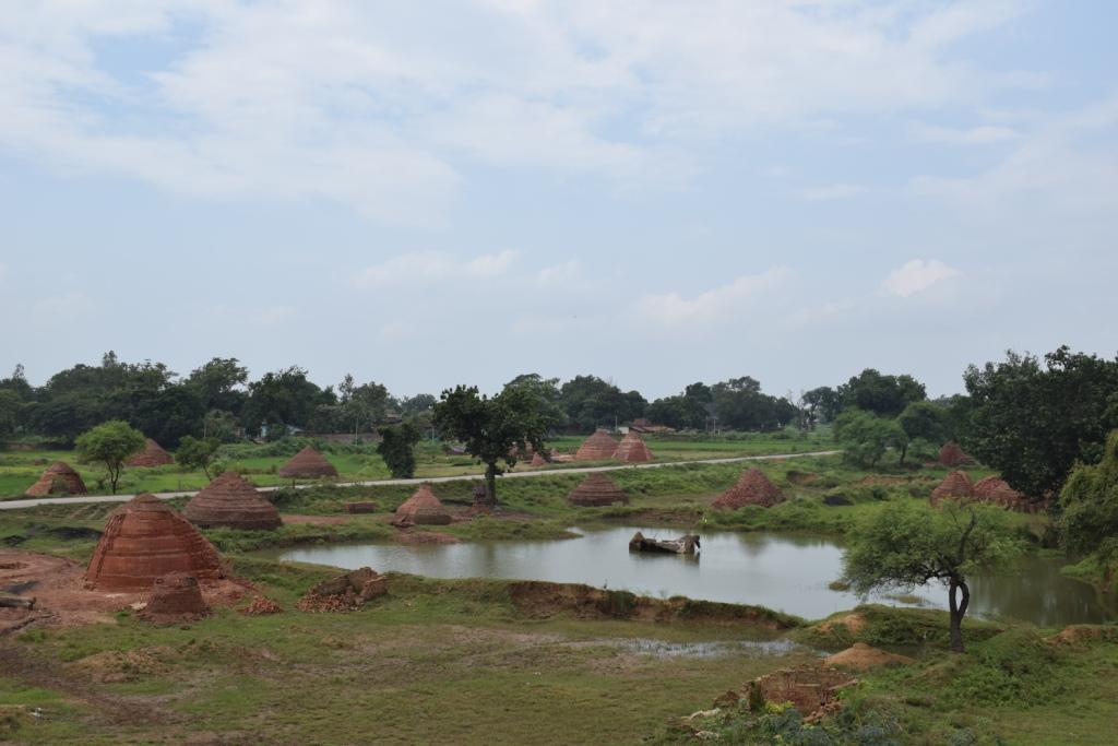 Crossing brick kilns in Chhattisgarh, India