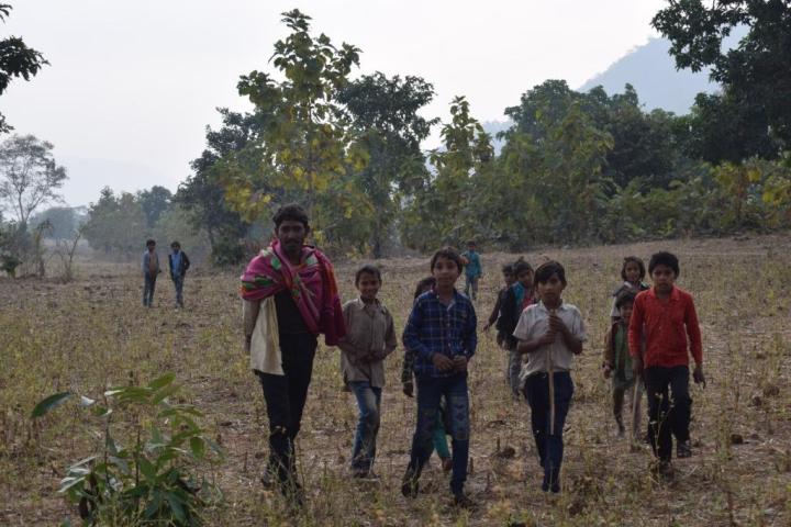 Greeted by the tribal children in Mandu, India