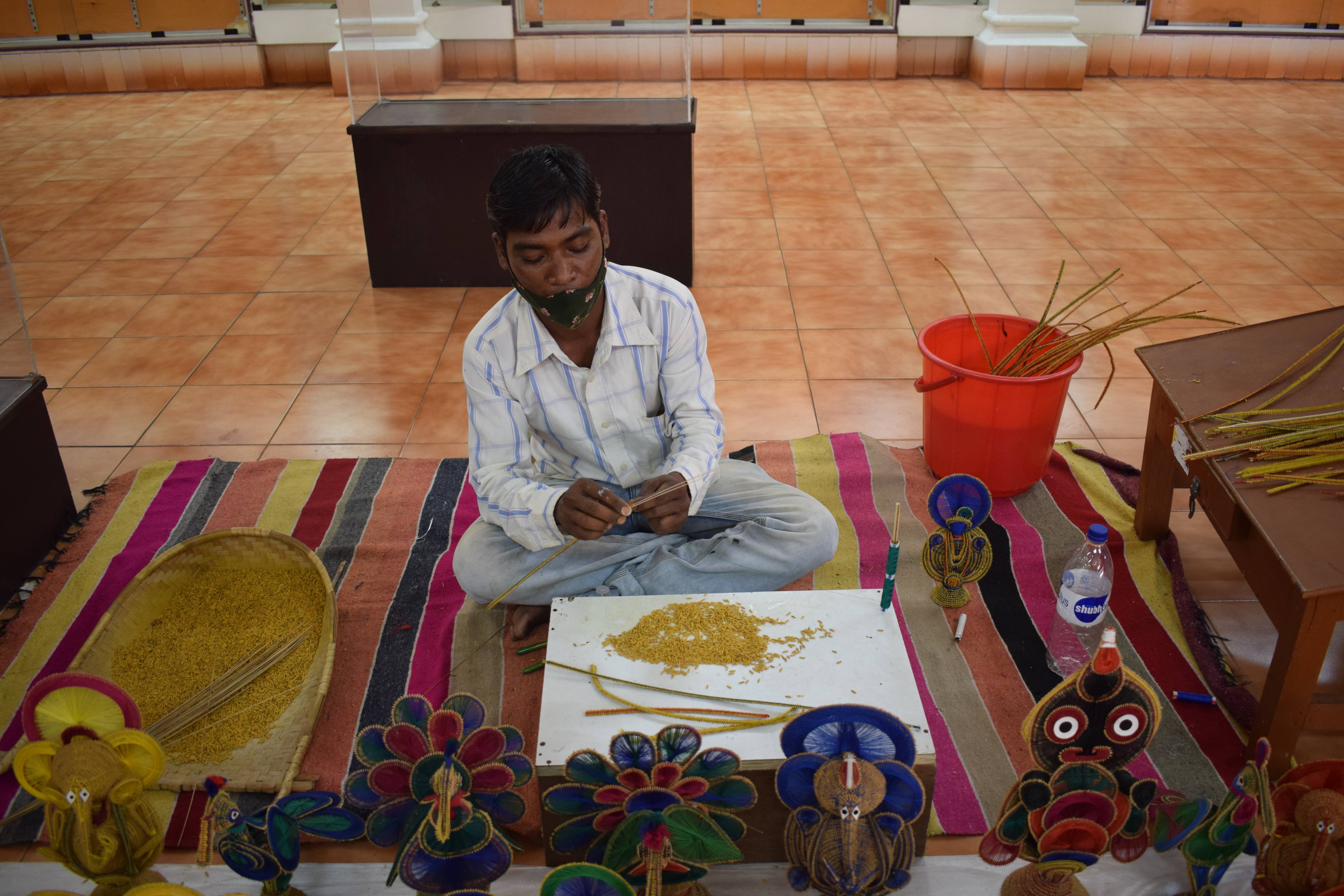 Artisan at work, Odisha State Tribal Museum, Bhubaneswar, Odisha, India