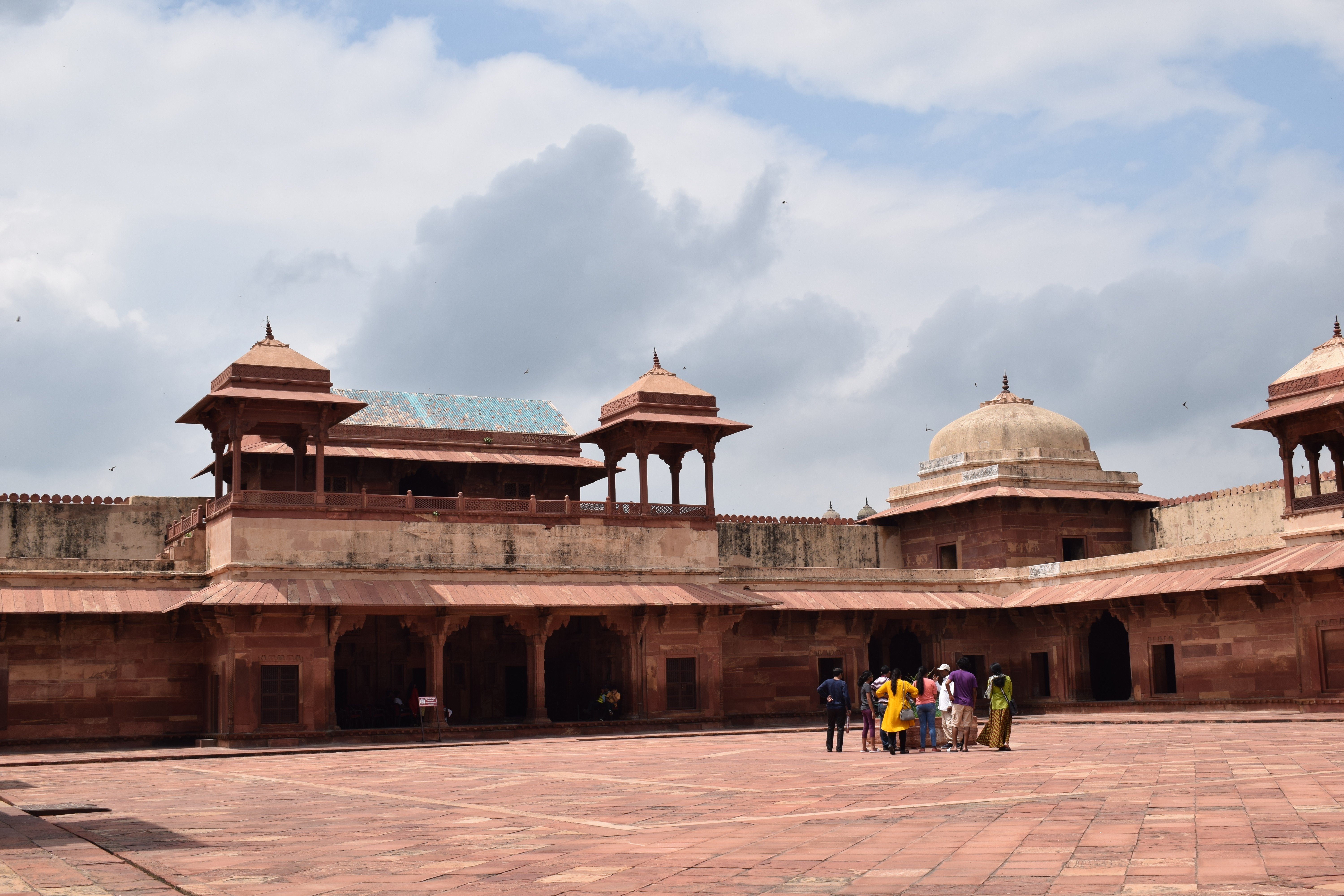 Palace of Jodha Bai, the largest building of the residential complex, has richly carved pillars, balconies, perforated stone windows, and an azure-blue ribbed roof on the north and south sides. We watched a short movie on the complex here.