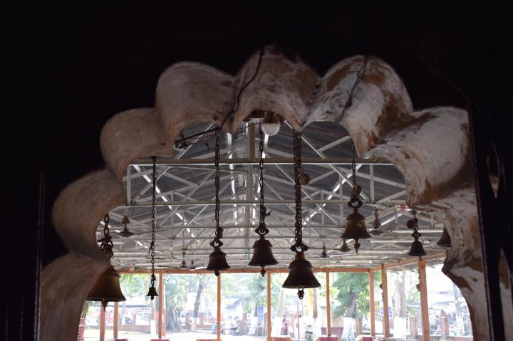Bells on entrance of Shiva temple, Sivasagar, Assam, India