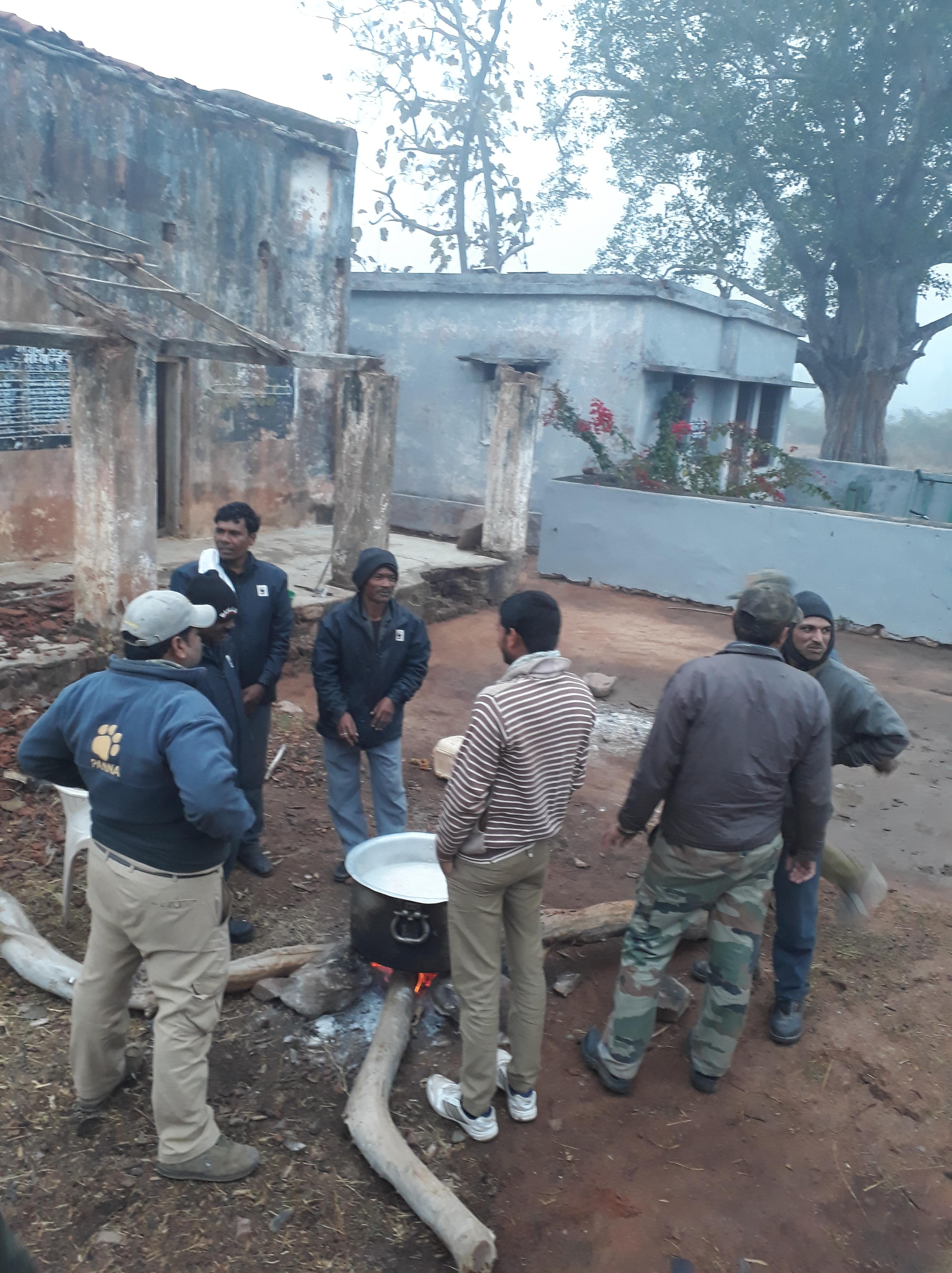 Forest guards cooking for the elephants inside Panna National Park, Khajuraho, Madhya Pradesh, India