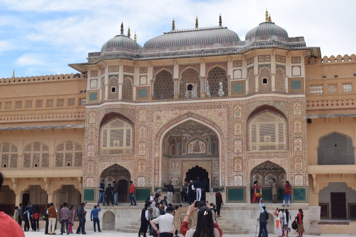 Intricate carvings to the door inside the courtyard, Amer Fort, Jaipur, Rajasthan, India
