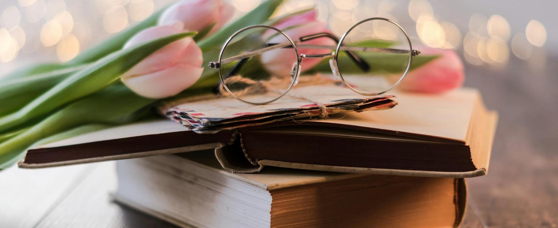 eyeglasses on a book