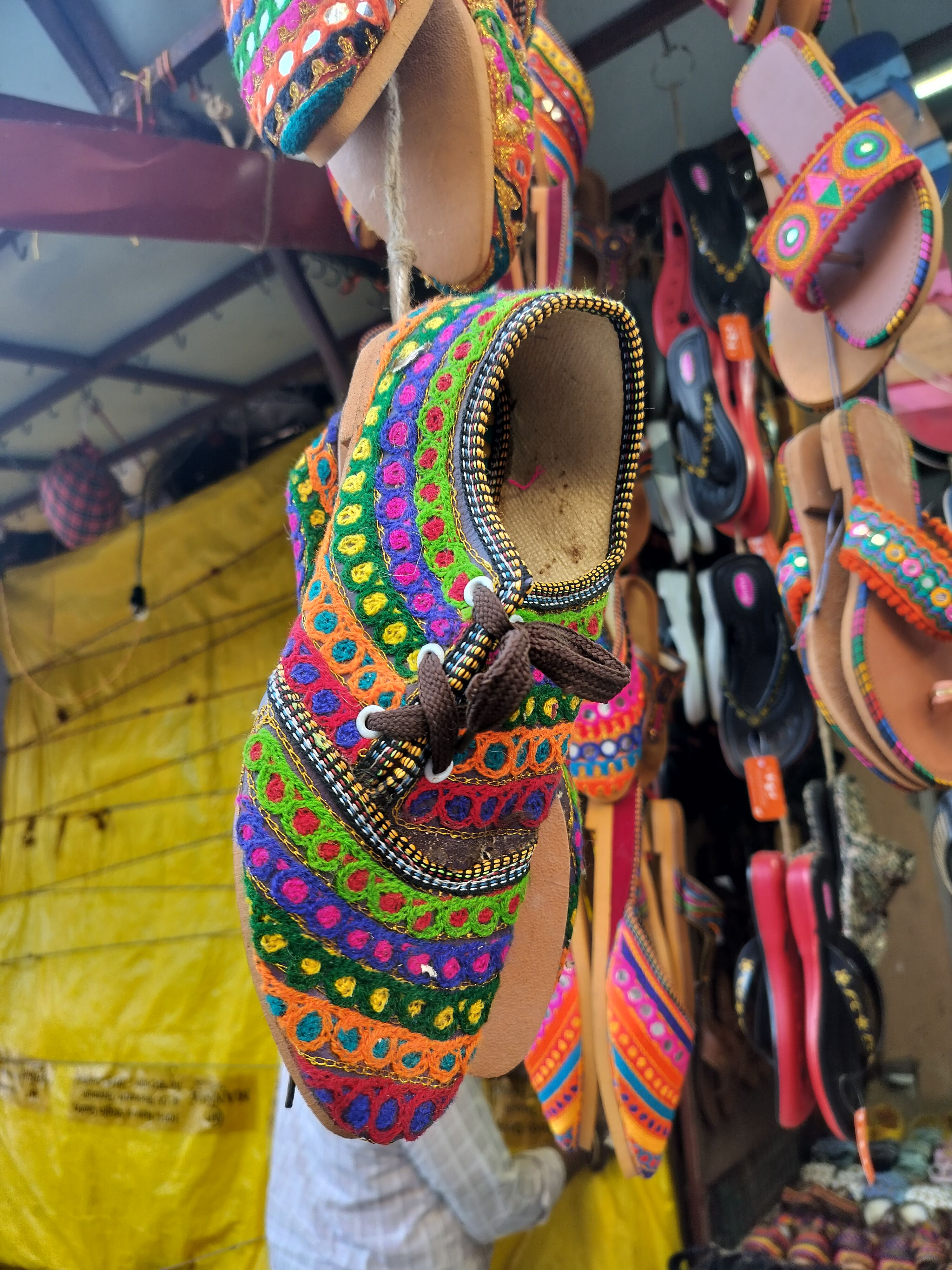 Handcrafted shoes (for shoes getting stolen outside temples is common) Trimbakeshwar temple, Nashik, Maharashtra, India