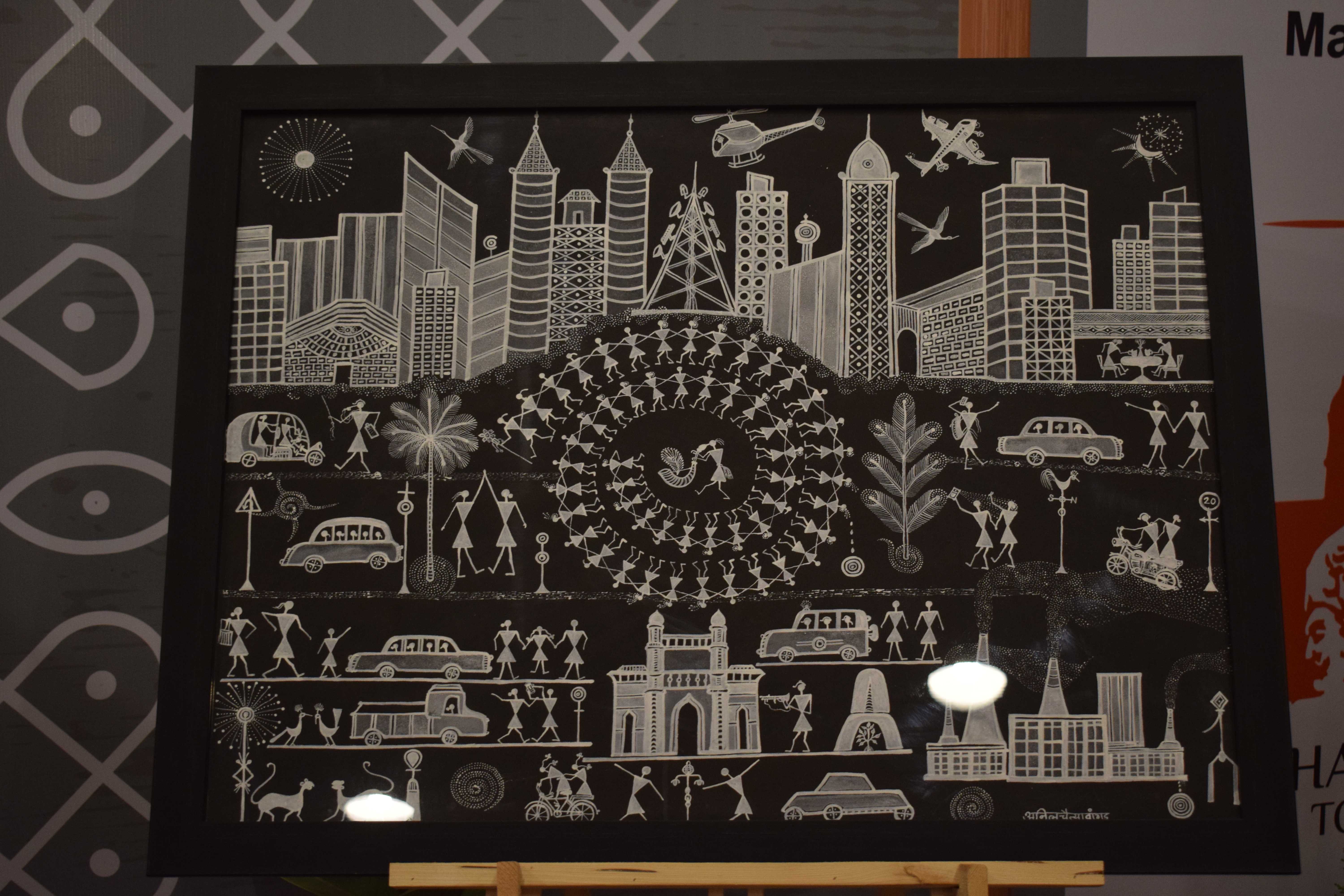 Changing narratives with charcoal background in Warli Art, Anil Vangad, Warli Artist, Gangapur Dam Backwaters, Nashik, Maharashtra, India