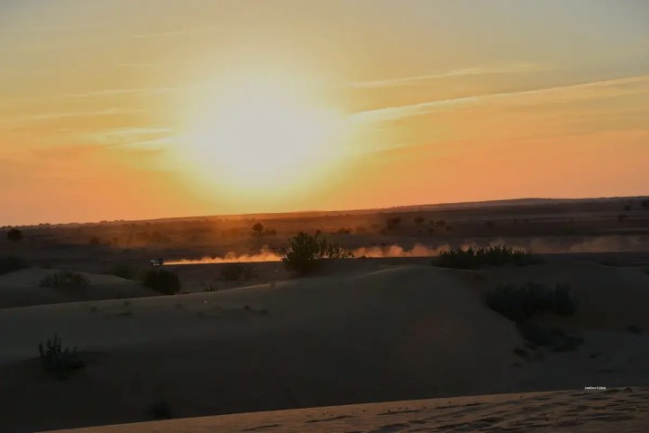 Driving through the dunes of Jaisalmer as the setting sun reveals all shades of sienna