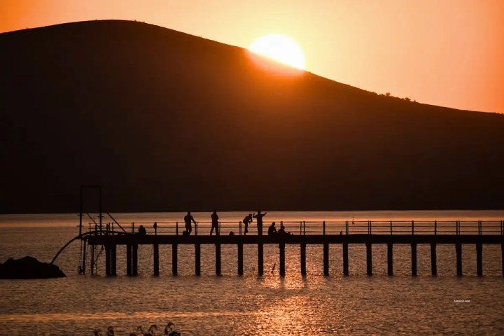 The world stops to watch the sun setting over Gangapur Dam in Nashik