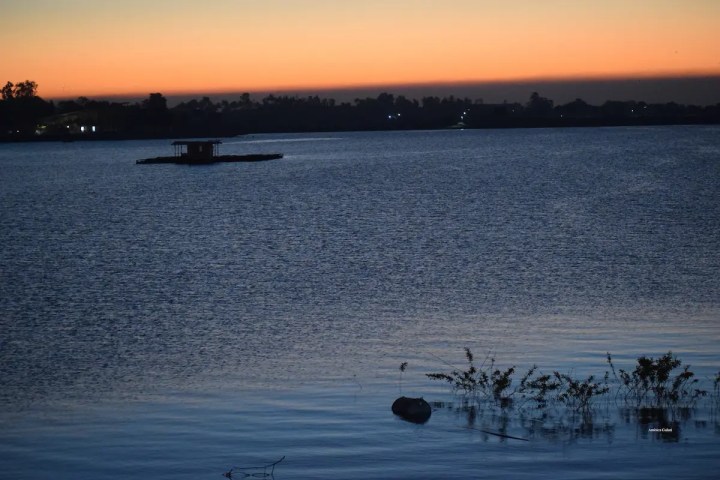 With the rising sun, Gangapur Dam in Nashik, becomes surreal